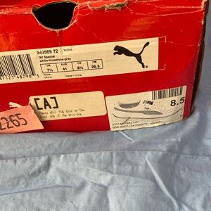 Used ladiesPuma White and Limestone Gray Sneakers